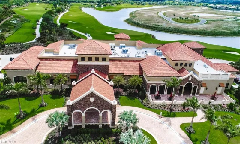 Expansive multi-building complex featuring Mediterranean-inspired architecture, terra cotta tile roofs, and stucco finishes
