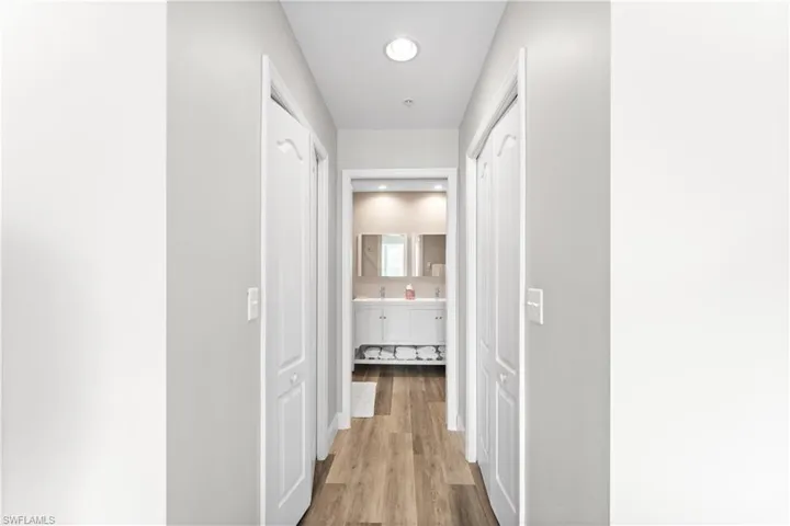 Hallway featuring light hardwood / wood-style flooring