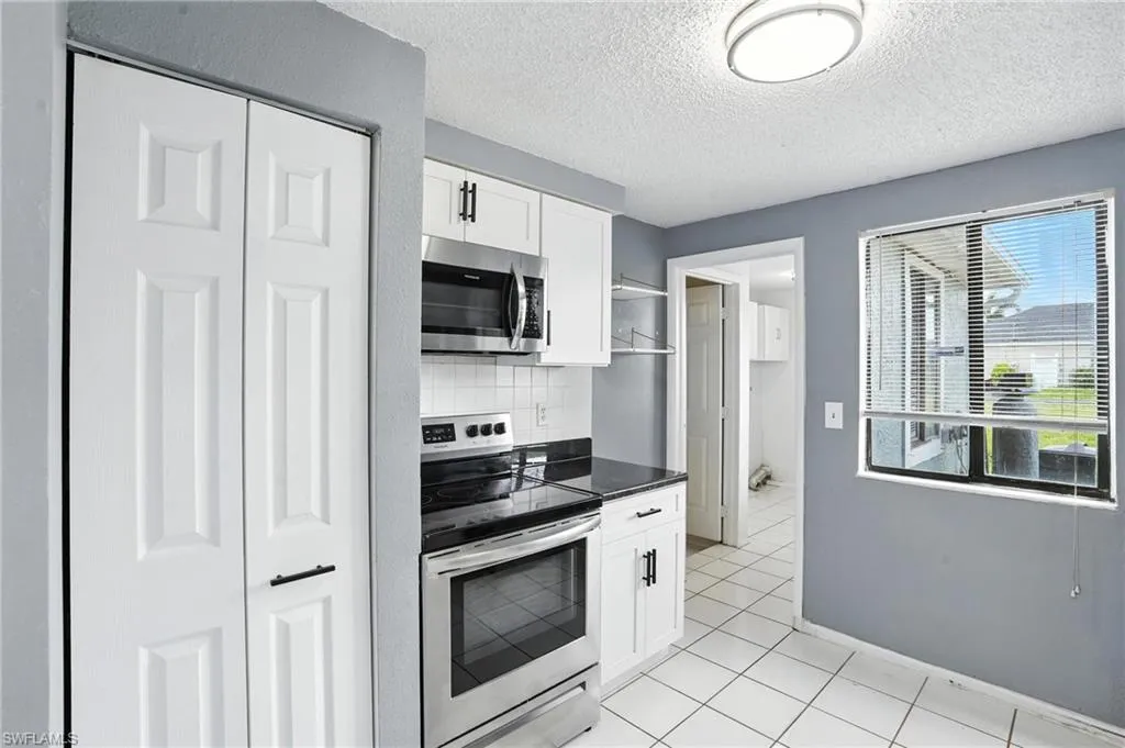 1222 14th PL, Cape Coral, FL 33909,2025000068