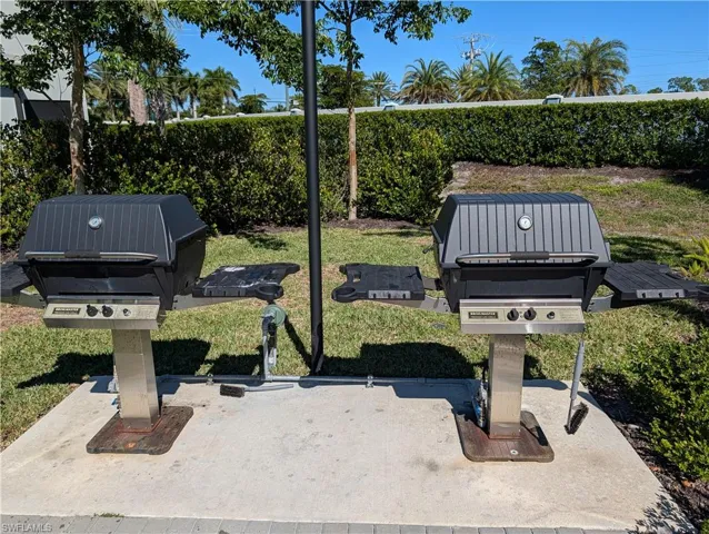 Surrounding community with a patio area