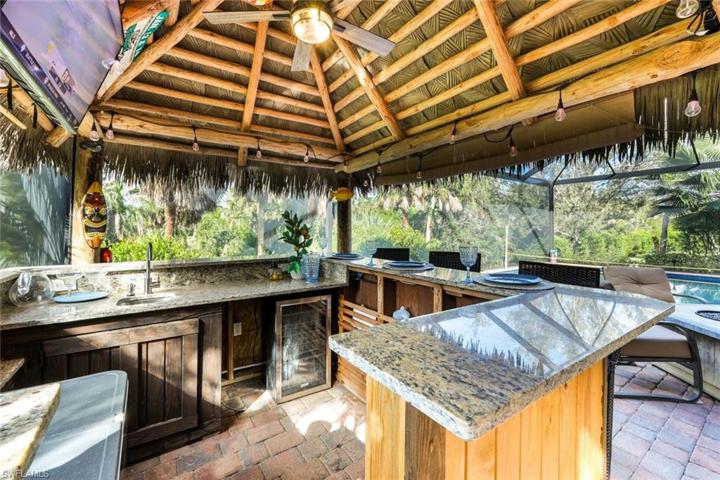 inside tiki bar TV FAN Lights cooler