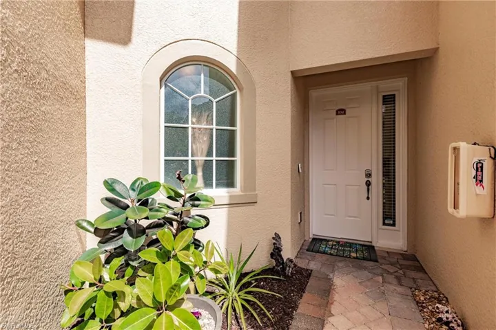 View of exterior entry to this first floor condo.