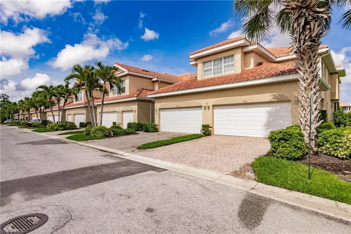 View of exterior with a two car garage