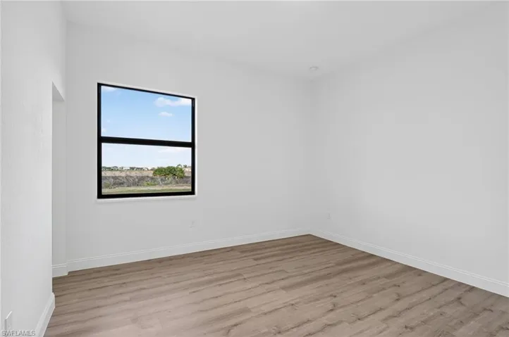 Spare room with light wood finished floors