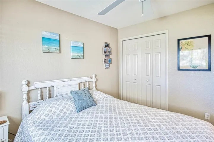 Bedroom featuring a closet and ceiling fan