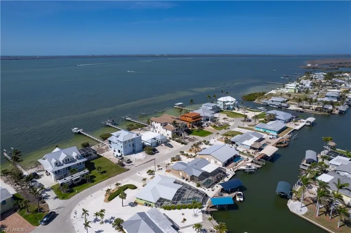 Bird's eye view featuring a water view and a residential view- quick access to the bay right up the canal and quick left.