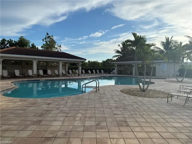 Community pool featuring a patio area