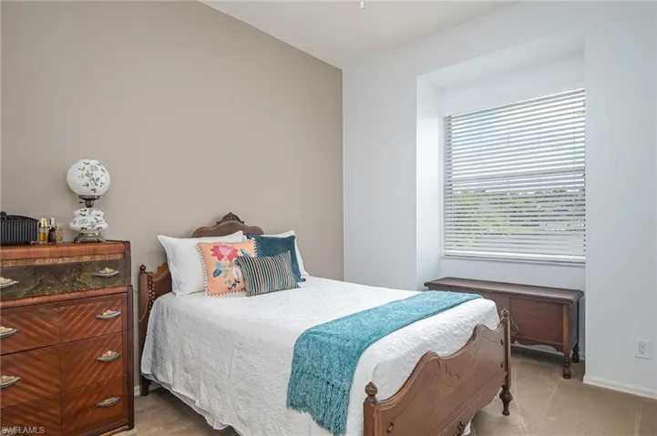 Bedroom with carpet flooring