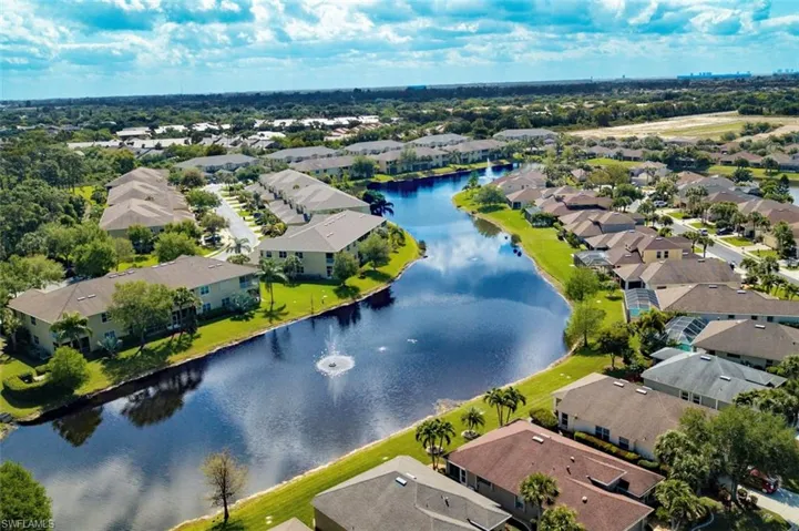 Aerial view of residential area with a large body of water