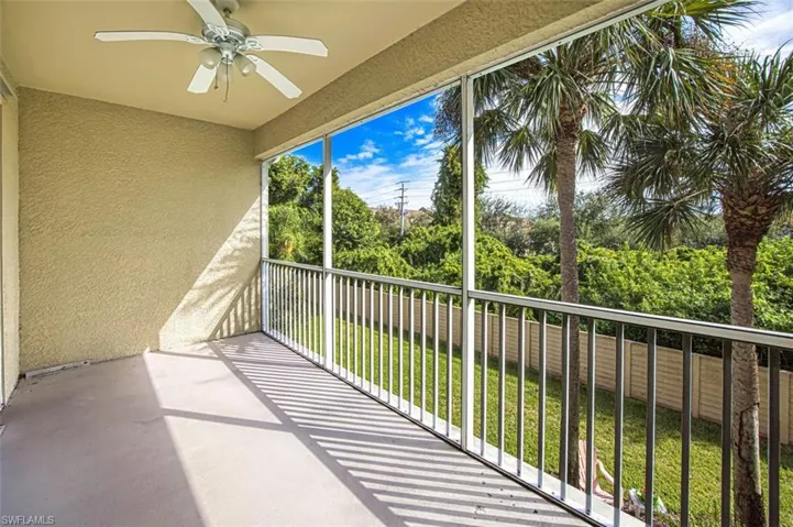 Balcony with a ceiling fan and a sunroom