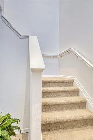 Staircase with a textured wall