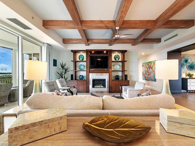 Custom cabinetry by Ruffino and a stainless surround gas fireplace.