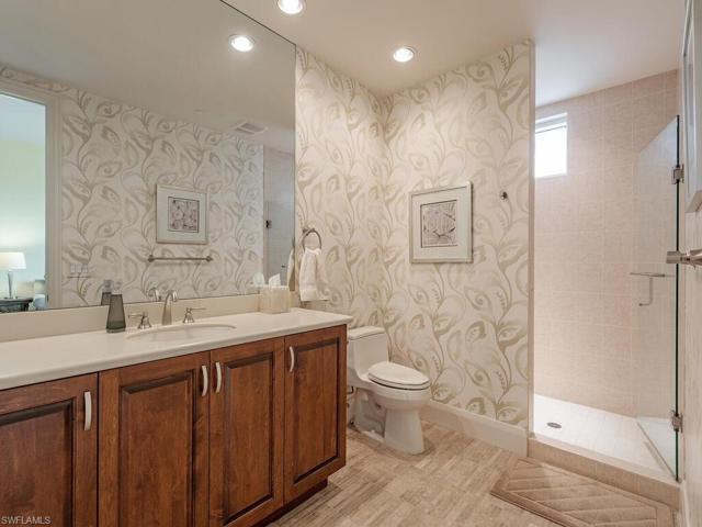 Large bathroom with walk in shower.