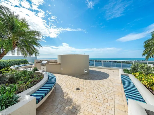 Rooftop terrace with amazing views of the gulf and Estero Bay.  Complete with grill, ice machines, or relax with a cocktail to your favorite tunes off your phone to the sound system.