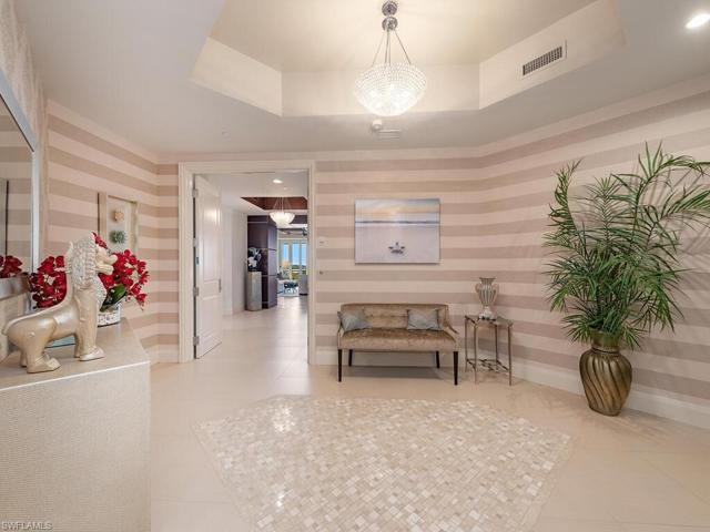 Private and secured elevator entry.  Beautiful tile inlay and neutral decor throughout.