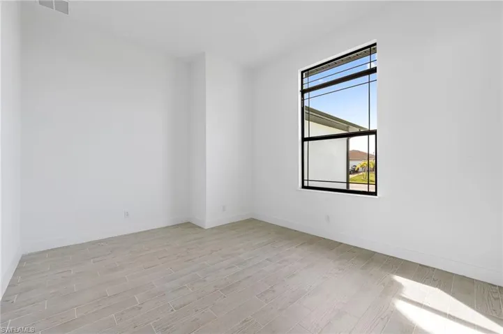 Spare room featuring light hardwood / wood-style flooring