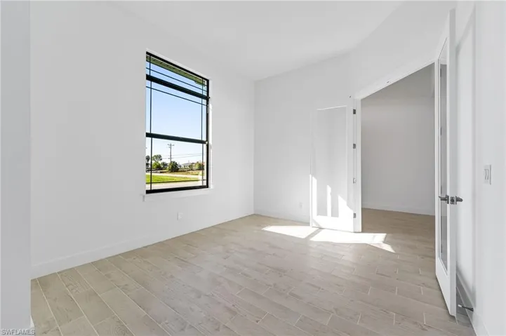 Empty room featuring light hardwood / wood-style flooring