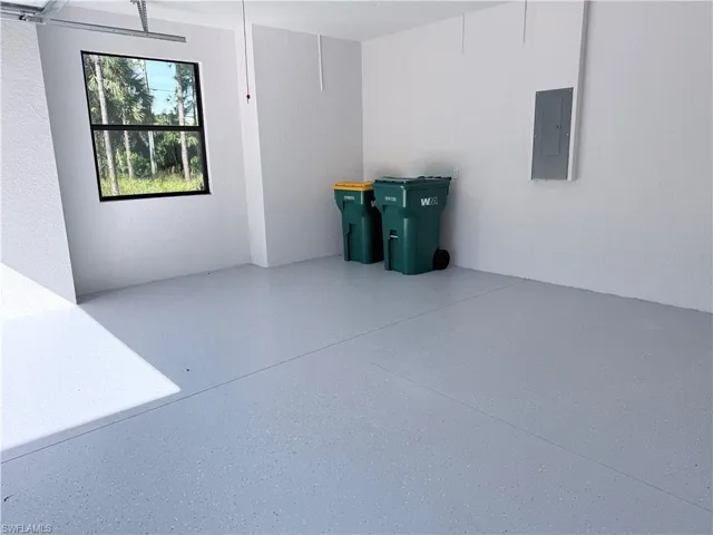 Unfurnished room featuring electric panel