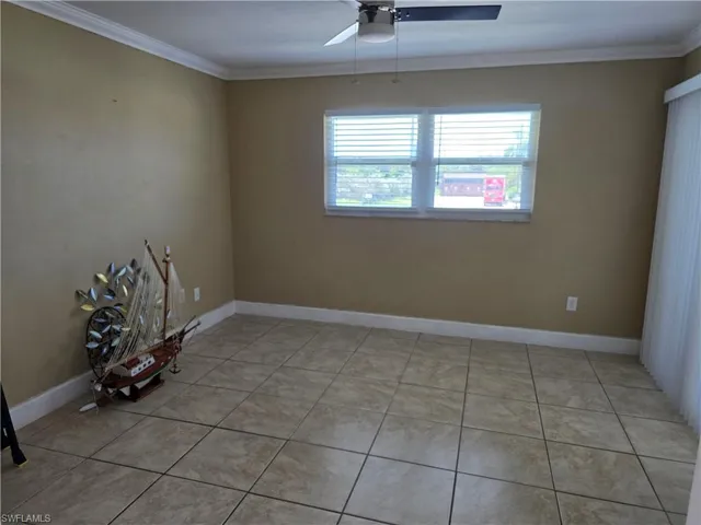 Neutral-toned walls with white crown molding
