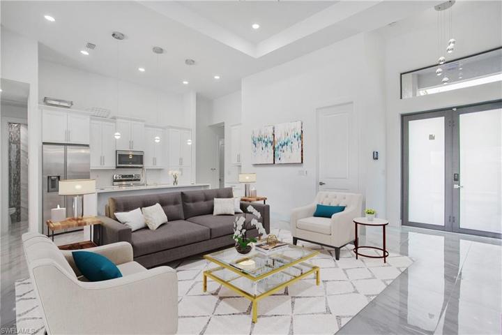 Photo has been reality renovated to showcase the possibility of the living room. Design services included with purchase!