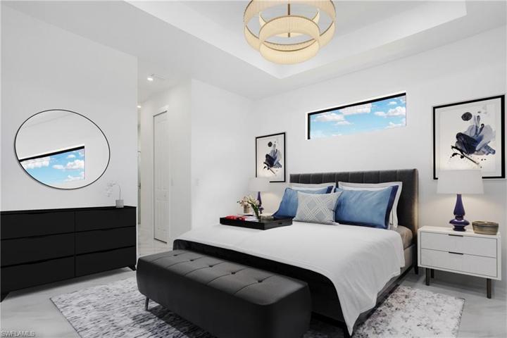 Photo has been reality renovated to showcase the possibility of Primary Bedroom. Design services included with purchase!