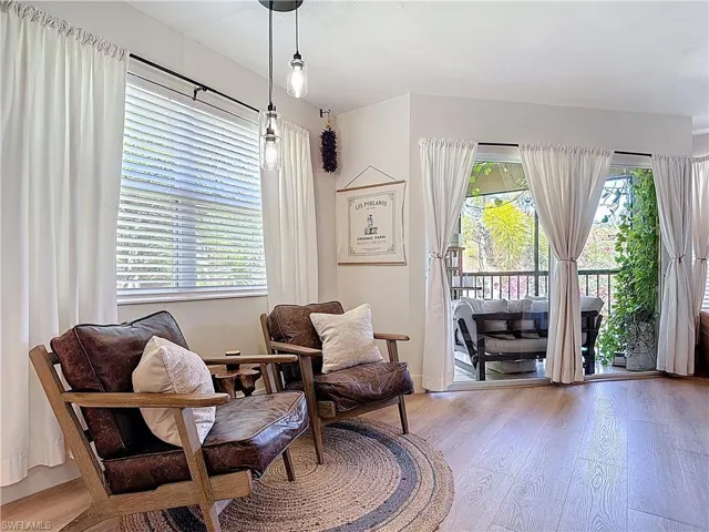 Sitting room featuring light wood-style floors
