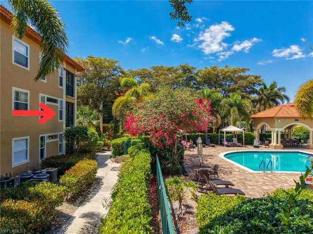 Pool with a gazebo and a patio
