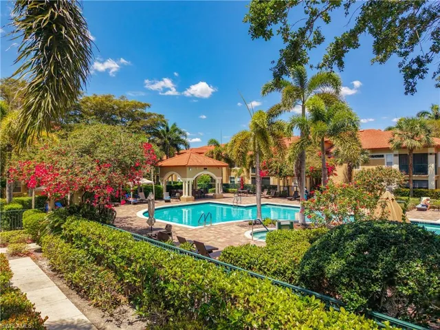 Pool with a gazebo, a patio area, and fence