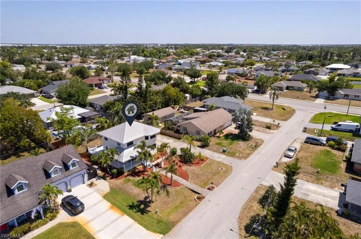 Birds eye view of property with a residential view