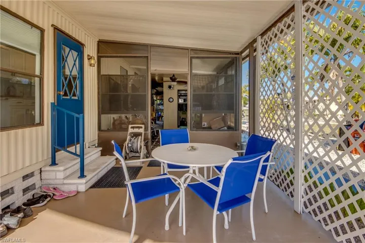 Sunroom with outdoor  patio, and entry steps