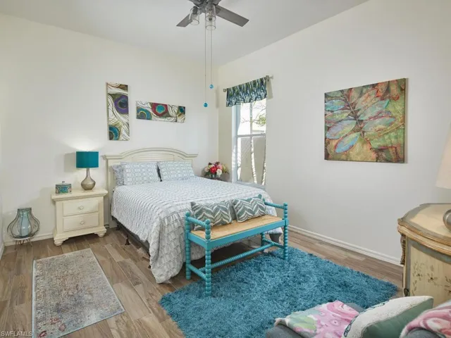 Guest bedroom with bright, airy décor.