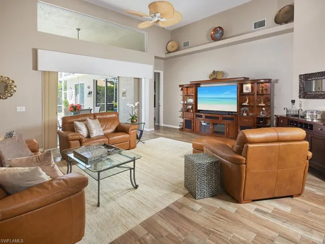 Inviting living area with large windows and natural light.