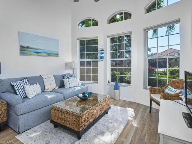 Cozy sitting area with large windows and natural light.