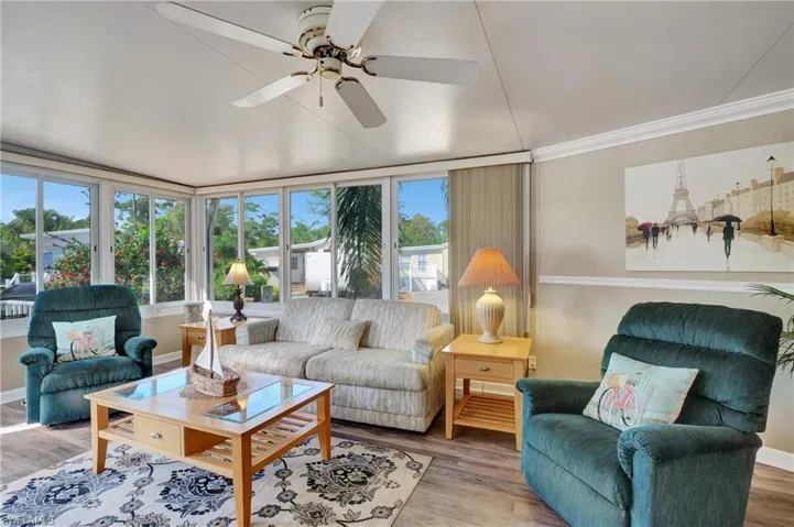 Living room featuring ceiling fan