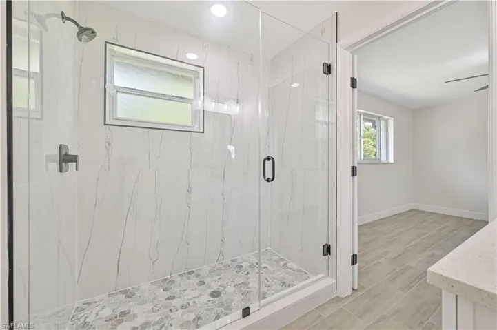main bath with huge walk in shower