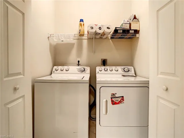 Laundry area featuring washing machine and dryer