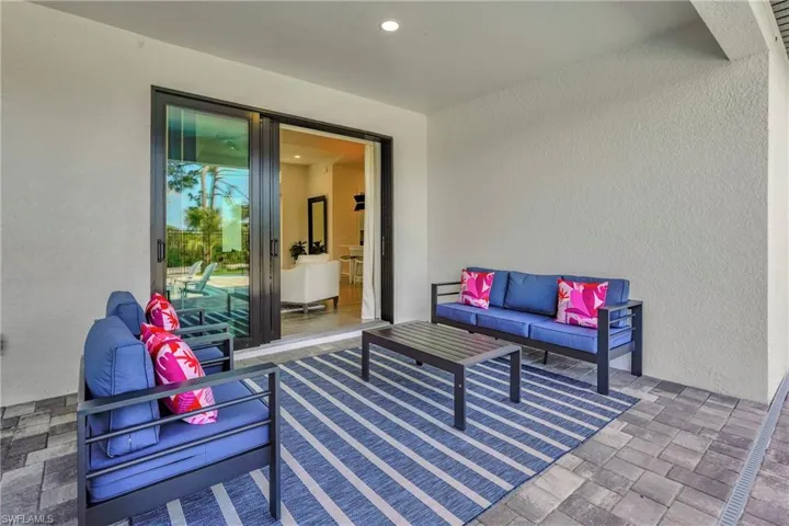 View of patio featuring an outdoor hangout area