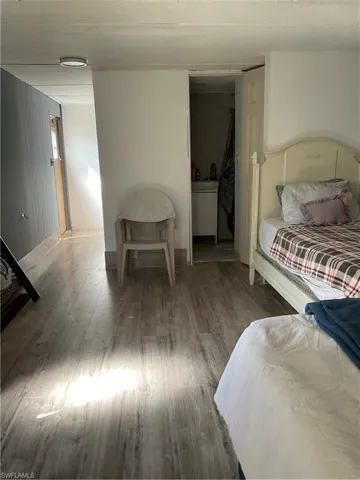 Bedroom with laminate flooring