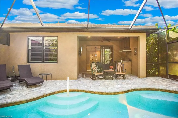 Outdoor enjoyment at its finest - TV, kitchen, dining and relaxing.