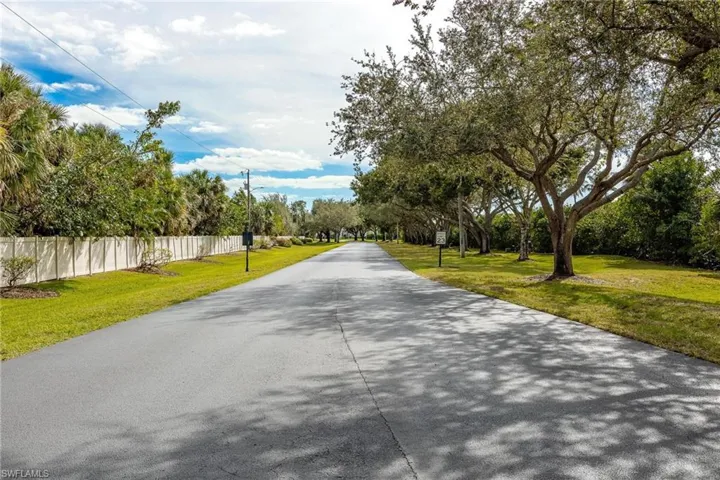 Road entering the community. The docks are located on the right.