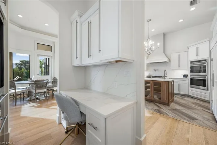 Wine bar/cooler and desk space.
