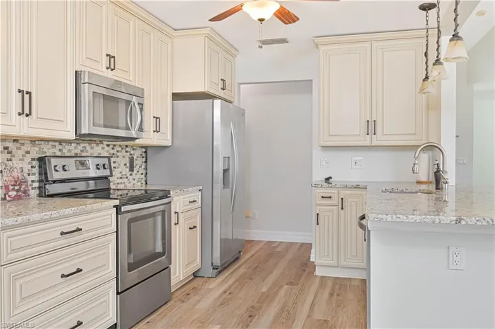 Full bathroom featuring shower / bathtub combination and vanity
