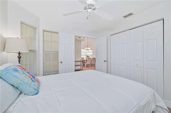 Bedroom featuring light wood-type flooring and a ceiling fan