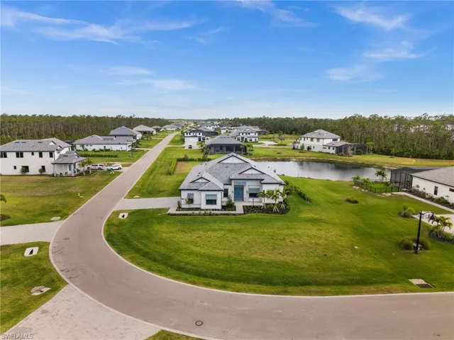 Aerial view of residential area with a nearby body of water