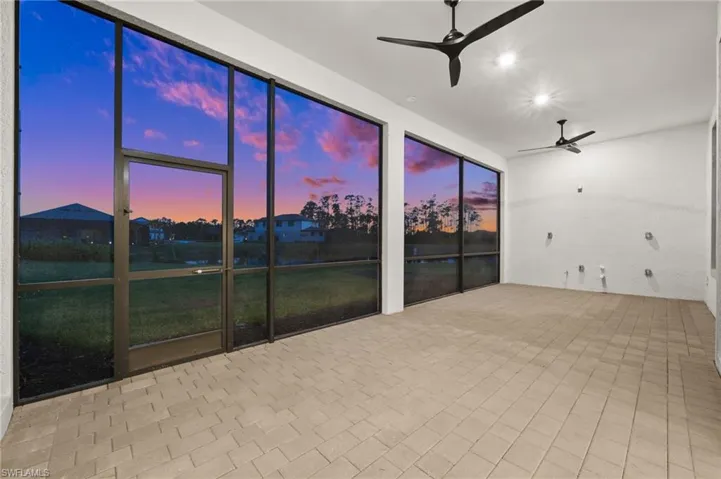 Unfurnished sunroom featuring recessed lighting