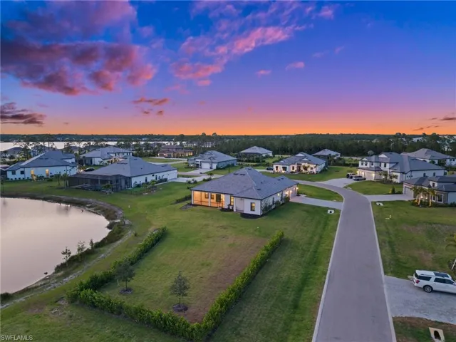 Aerial view of residential area with a nearby body of water