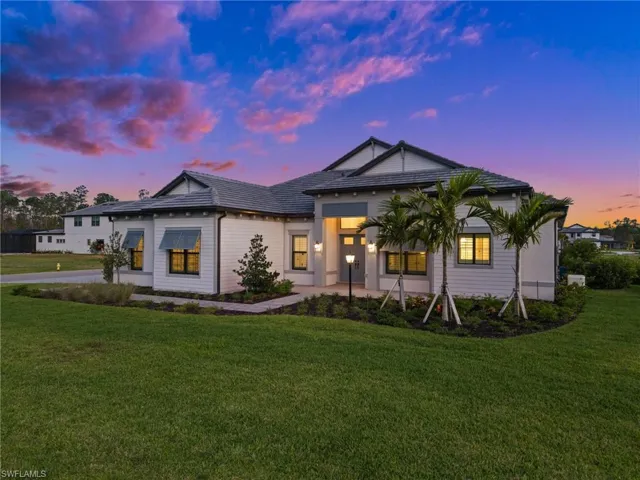 View of front of property with a front yard