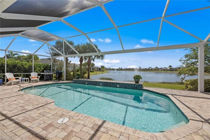 Relax in the pool and enjoy the long view of the lake