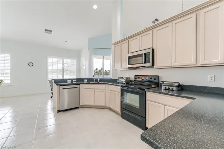 Large kitchen open to the family room and eat-in area