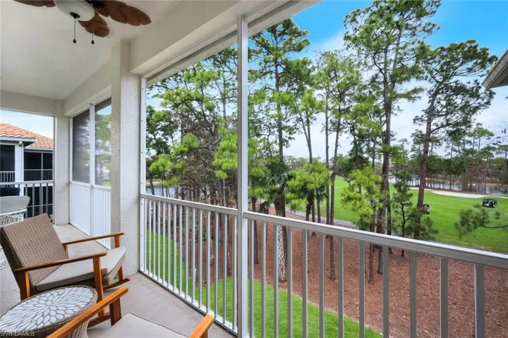 Lanai with fan and view of lake and golf course